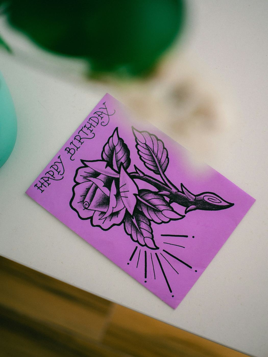 A hand-drawn rose birthday card